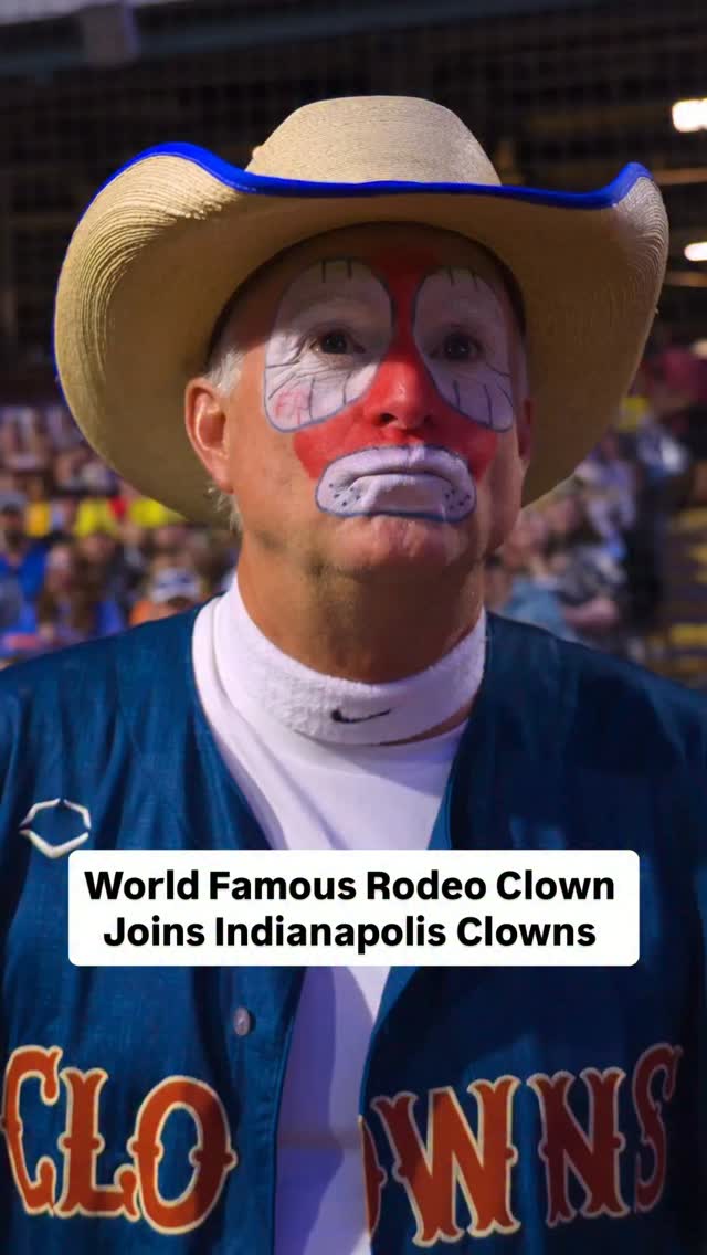 Montana's Flint Rasmussen, a longtime professional rodeo entertainer, joined Matt Wolf on the pitcher's mound to perform for the crowd at an Indianapolis Clowns baseball performance.