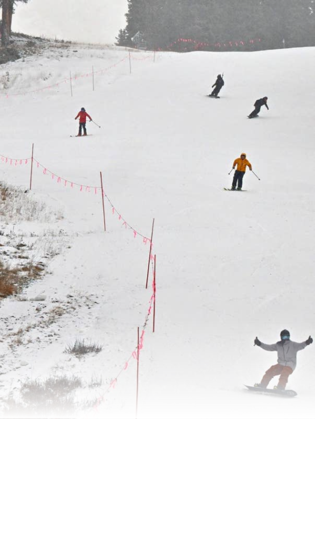 Early season skiing on narrow strips of man-made snow offers a sense of gratitude for those eager to get back on the hill before the storms arrive. The limited terrain remains a cherished ritual while waiting for winter to start.