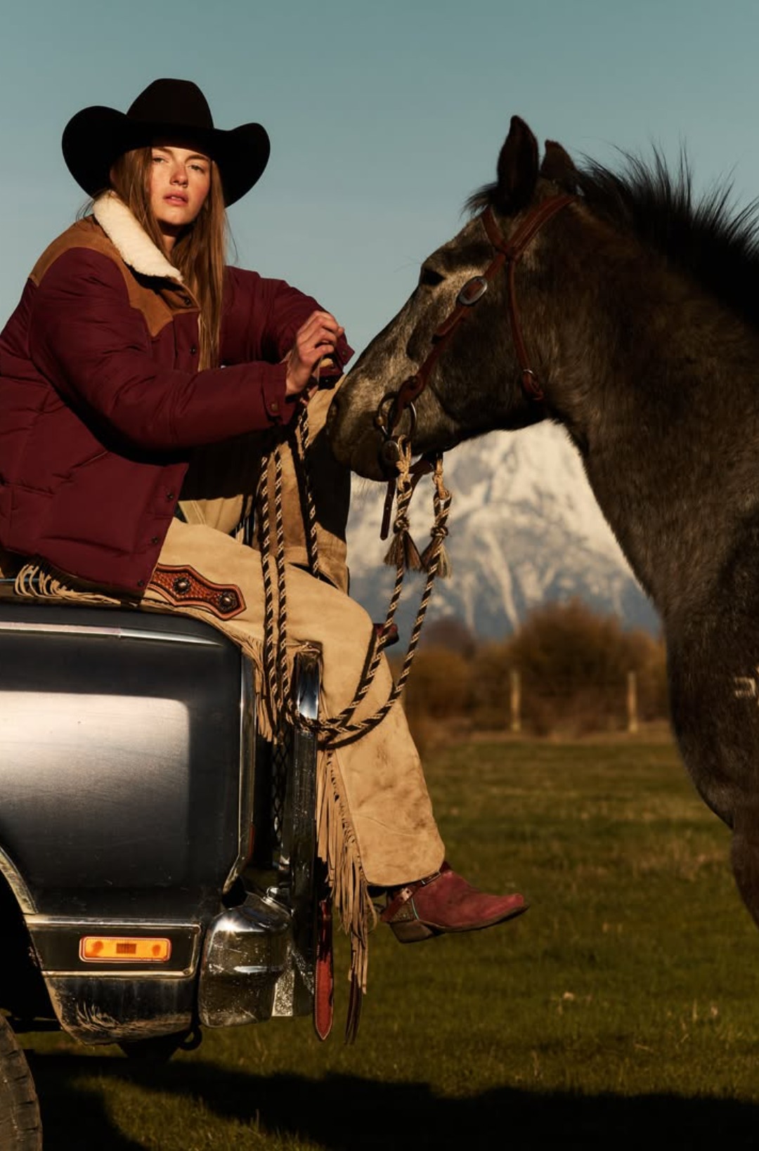 Wyoming Puffer 100% Made in the USA Heavy-duty brass snap hardware Double-stitched throughout for added durability Real shearling collar Genuine calf suede leather yoke A western take on the classic puffer.